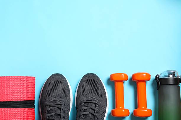 istock Sport equipment on color background, top view 2252604144