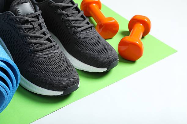 istock Sport equipment on color background, top view 2252604237