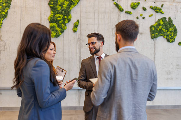 istock Business colleagues networking during informal meeting in modern office 2252605198