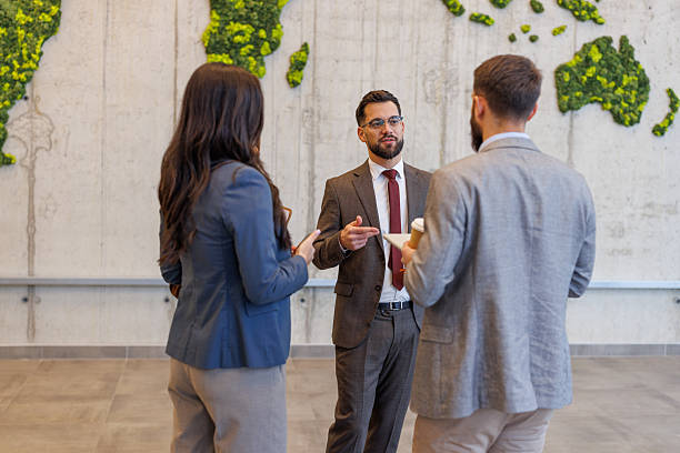 istock Business colleagues discussing project with world map background 2252605244