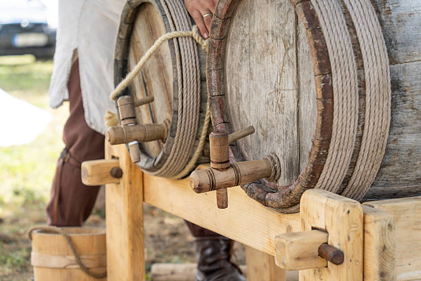 istock Medieval wooden beer barrels with spigots 2252606026