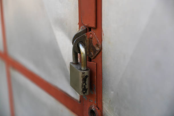 Close-Up View Of A Padlock Securing A Surface, Symbolizing Safety, Protection, Security, Privacy, And Restricted Access Across Various Environments And Materials.
