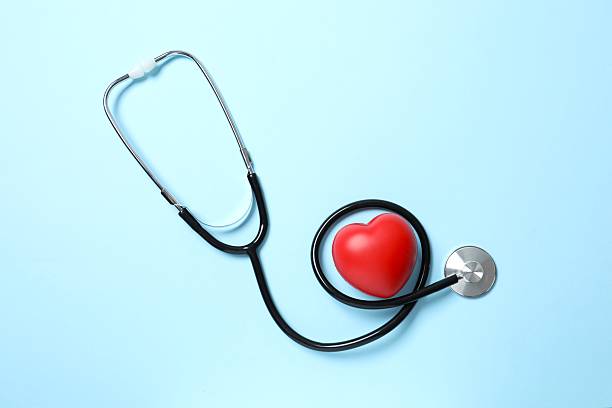 istock Stethoscope with red heart on blue background, top view 2252608802
