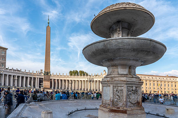 A closeup shot of one of the twin fountains in St Peter's Square in the Vatican