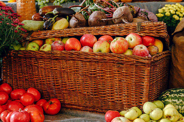 istock fresh apples in a large woven basket 2252610132