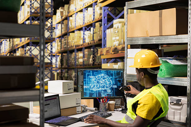 istock Worker taking scanner to register shipping labels tracking info with AI brain 2252619883