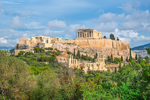 The ancient Acropolis on Acropolis Hill in Athens, Greece, with the Parthenon, Erechtheion, Propylaea, Temple of Athena Nike and Odeon of Herodes Atticus in view.