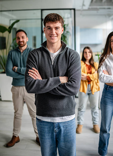 istock Team members collaborate in modern office during work hours with smiles and confidence 2252626253