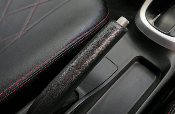 istock Auto details hand brake. Hand brake in a car 2252627310