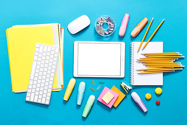 istock Modern tablet, keyboard and stationery on light blue background, flat lay. Space for text 2252636976