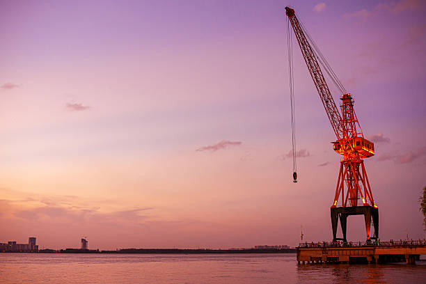 Commercial dock crane at dusk