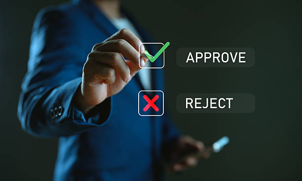 istock Approved, accept, pass inspection, Businessman writing or tick correct mark to approve document and project concept. Management, manager, examine, survey, tick, certification, business, technology. 2252640633