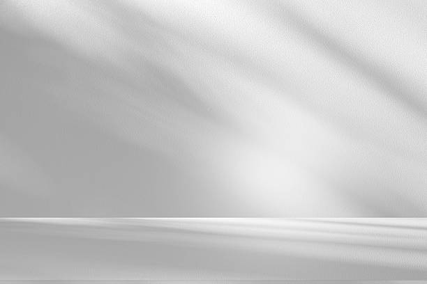 istock Wall interior background, studio and backdrops show products.with shadow from window color white . background for text insertion and presentation product 2252641790