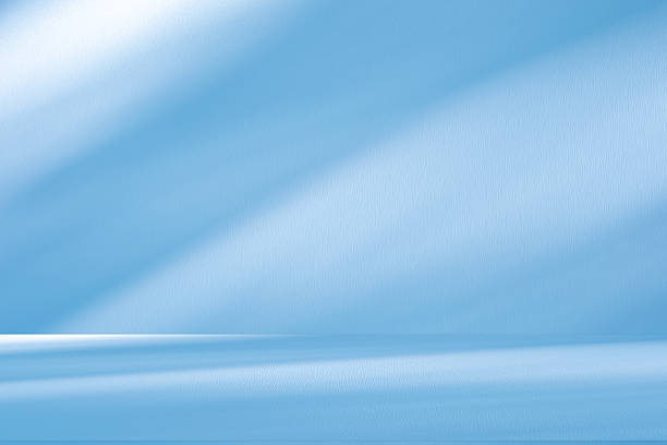 istock Studio style background wall decoration presentation uses white and blue tones. with shadows cast from a nearby window, concept creating a decorative 2252642323