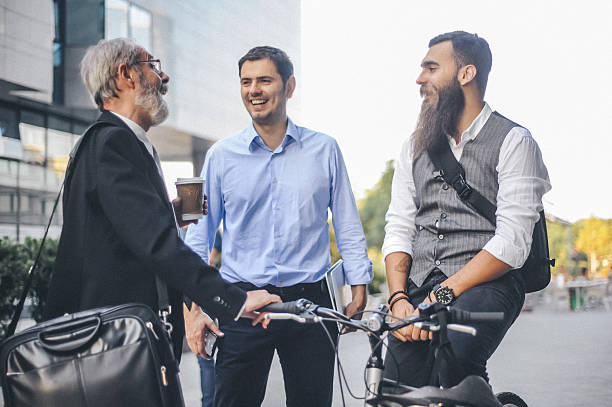 istock Three Businessmen Socializing Outdoors 2252645137