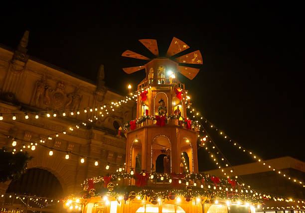 istock Celebration at night with lights and decorations in the central square 2252650375