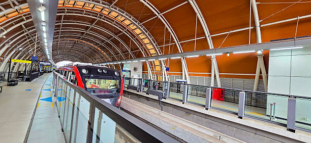 istock Light Rail Transit or LRT or rail transport system in Indonesia, modern metro train stationed at an urban platform, showcasing efficient public transport system 2252650829