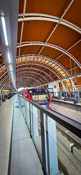 istock Light Rail Transit or LRT or rail transport system in Indonesia, modern metro train stationed at an urban platform, showcasing efficient public transport system 2252650830
