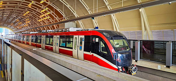 istock Light Rail Transit or LRT or rail transport system in Indonesia, modern metro train stationed at an urban platform, showcasing efficient public transport system 2252650849