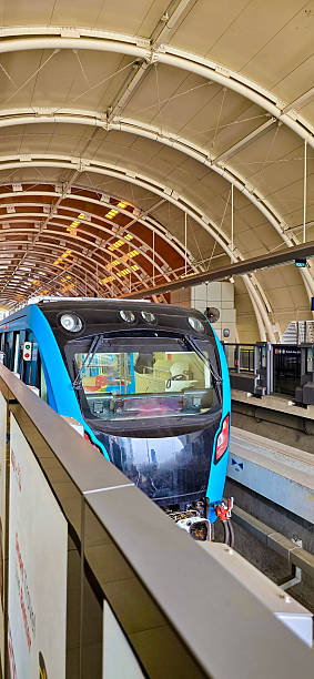 istock Light Rail Transit or LRT or rail transport system in Indonesia, modern metro train stationed at an urban platform, showcasing efficient public transport system 2252650852