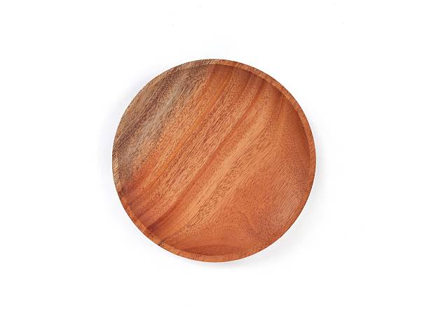istock Empty wooden plate isolated white background 2252651494