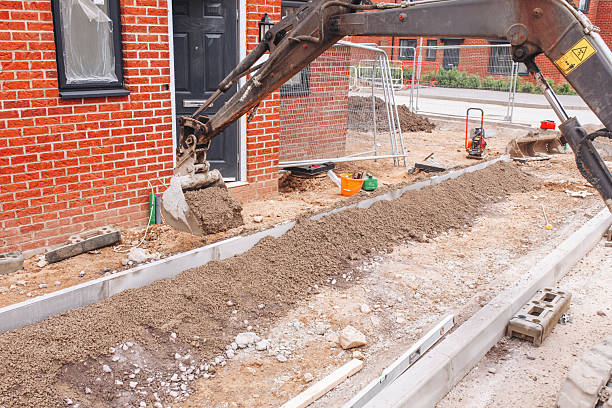 istock Concrete pin kerb edging installed for new footpath and secured with semi-dry concrete 2252654626