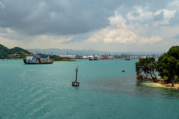 istock Ferry Crossing Industrial Bay Under Storm Clouds 2252657228