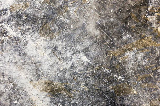 istock Natural stone surface texture. Rough rock background detail. Gray mineral pattern closeup. Weathered stone slab surface. 2252658632