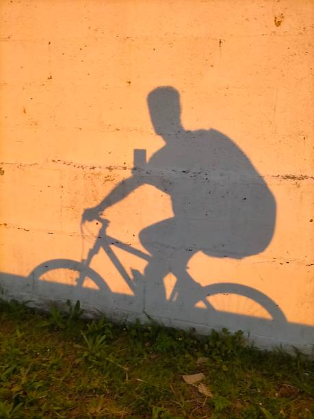 The shadow of a cyclist