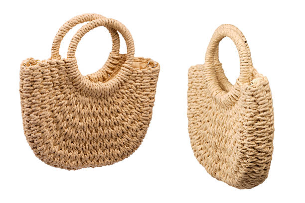 istock A beige straw bag isolated on a white background. 2252661918