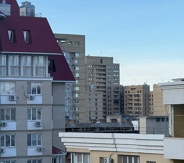 istock Several high-rise buildings coexist in an urban setting under clear blue skies 2252662916