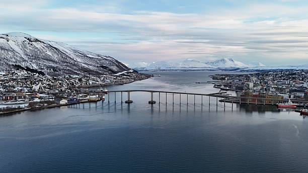 Beautiful drone video of the bridge between city of Tromsdalen and the island nearby, Tromsø, Norway.
