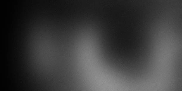 istock Noisy gradient black gray dark grainy blurred abstract curved pattern monochrome background 2252677243