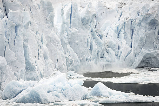 Iceberg in antarctica. Transparent ice glaciers melting with no background. Sunny melting glacial ice Atlantic Ocean Greenland. blue and white snow