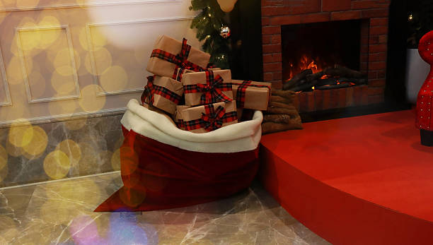 istock Christmas Gift Boxes with Plaid Ribbons and  Celebration with Bokeh Lights 2252678348