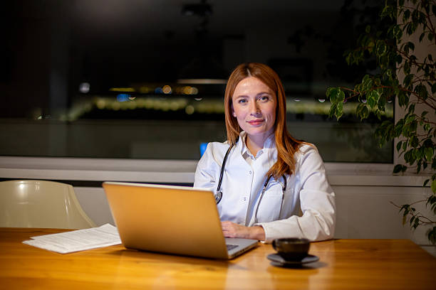 istock Doctor working late night shift with laptop 2252680398