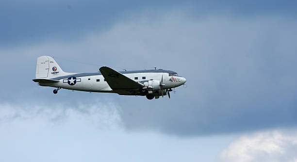 Ickwell, Bedfordshire, England - May 31, 2025: Classic 1944 Douglas R4D-6S Skytrain in flight