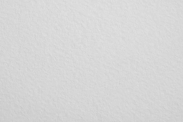 istock White textured paper surface creating an abstract clean background for art, or display design, rustic product 2252681358