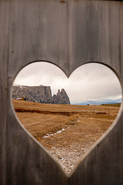 istock Heart shaped frame with alpine landscape in Dolomites mountains 2252681425