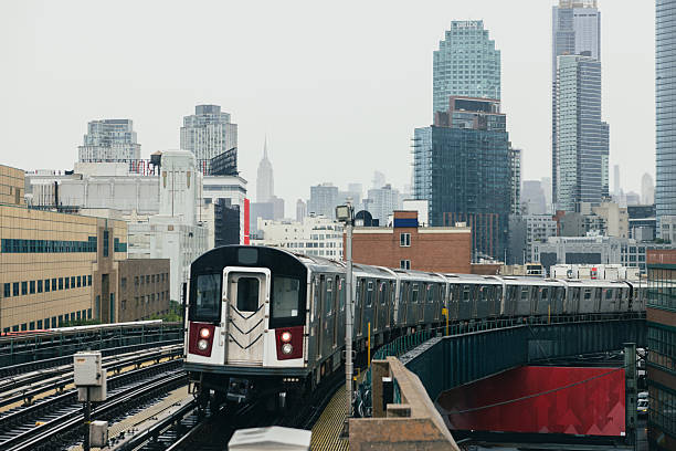 istock Subway train approaching elevated station in New York City 2252682387