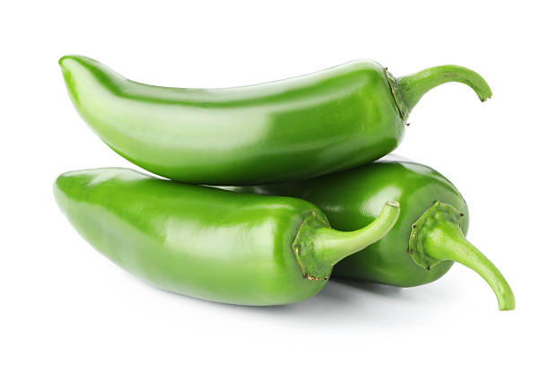 istock Many green jalapeno peppers isolated on white 2252684772