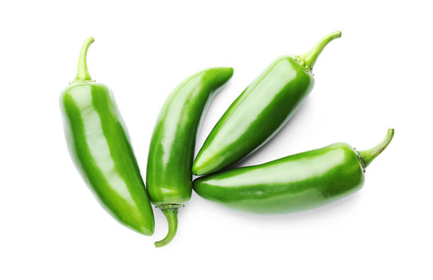 istock Many green jalapeno peppers isolated on white, top view 2252684838