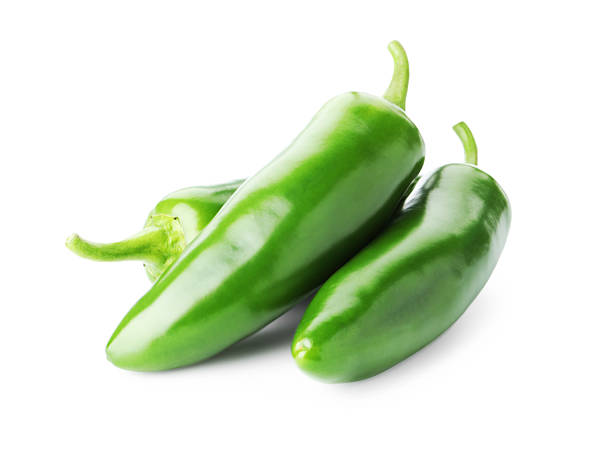 istock Many green jalapeno peppers isolated on white 2252684915