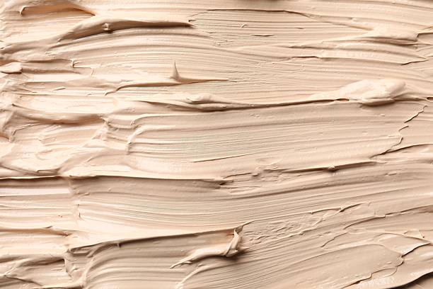 istock Texture of liquid foundation. Makeup base, BB cream smear background 2252685196
