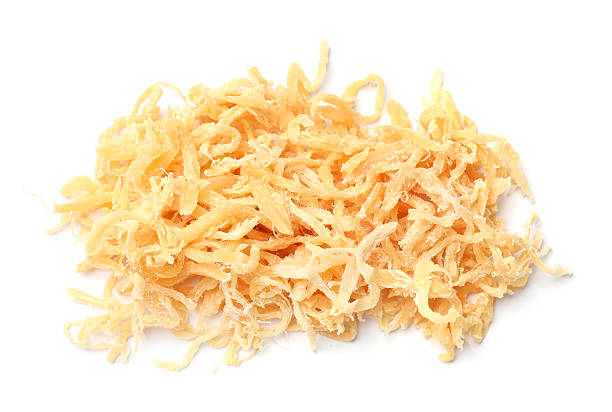istock Tasty dried squid shavings isolated on white, above view 2252690698