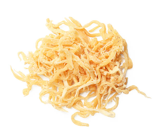 istock Tasty dried squid shavings isolated on white, top view 2252690727