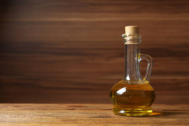 istock Bottle of fresh oil on the table 2252691217