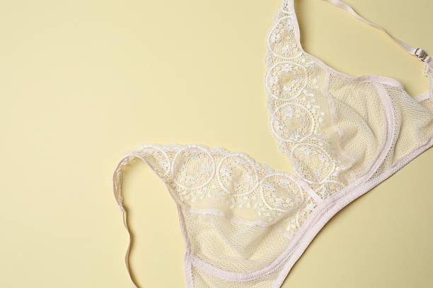 istock Flat lay with women romantic underwear on beige background, top view 2252692896