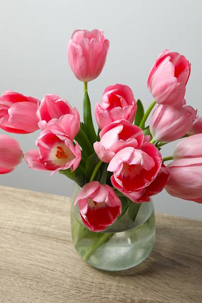 istock Beautiful fresh tulips in a vase on the table 2252692921