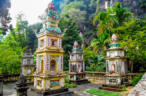 Ho Chi Minh, Vietnam 12 December 2015: Traditional Vietnamese statues displayed in temple setting, carved figures with historic details, cultural heritage art, Asian religion sculpture, stone and wood materials, travel destination in Vietnam